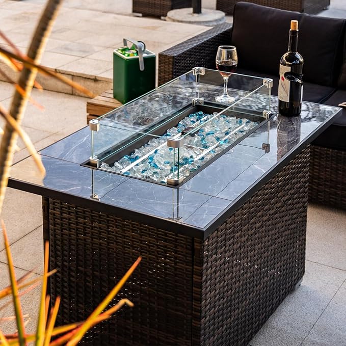 44in Outdoor Propane Gas Fire Pit Table, 50,000 BTU Auto-Ignition Gas Firepit with Glass Wind Guard, Marble Tile Tabletop, Mixed Color Glass Rocks, Brown PE Rattan